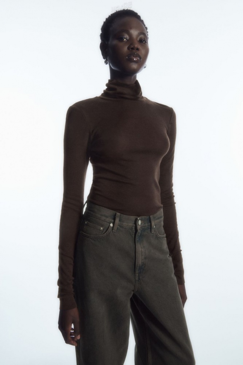 Black COS Merino Wool Turtleneck Top Tops | 274069-KBP