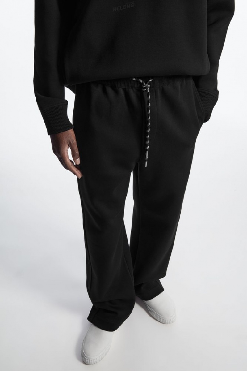 Black COS Relaxed Scuba Joggers Suit Trousers | 504783-XEK