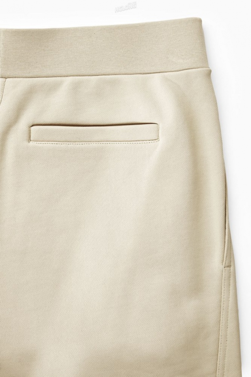 Light Beige COS Exposed-Seam Jersey Sweatpants Pants | 067584-OUR